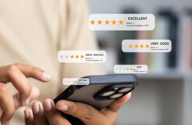 Customer reviews and ratings shown on mobile, representing digital word of mouth marketing feedback.