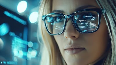 Woman with glasses, with agentic AI written in the reflection.