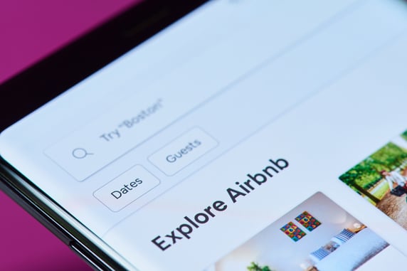 Using digital word of mouth marketing to explore Airbnb offerings on a mobile device.